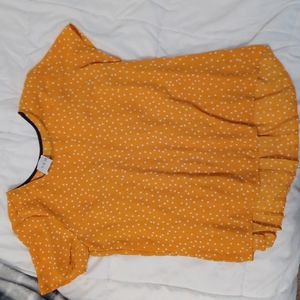 Baby doll polka dot top with pleated back design